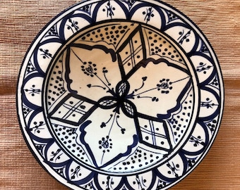 Antique white Moroccan plate with blue decoration