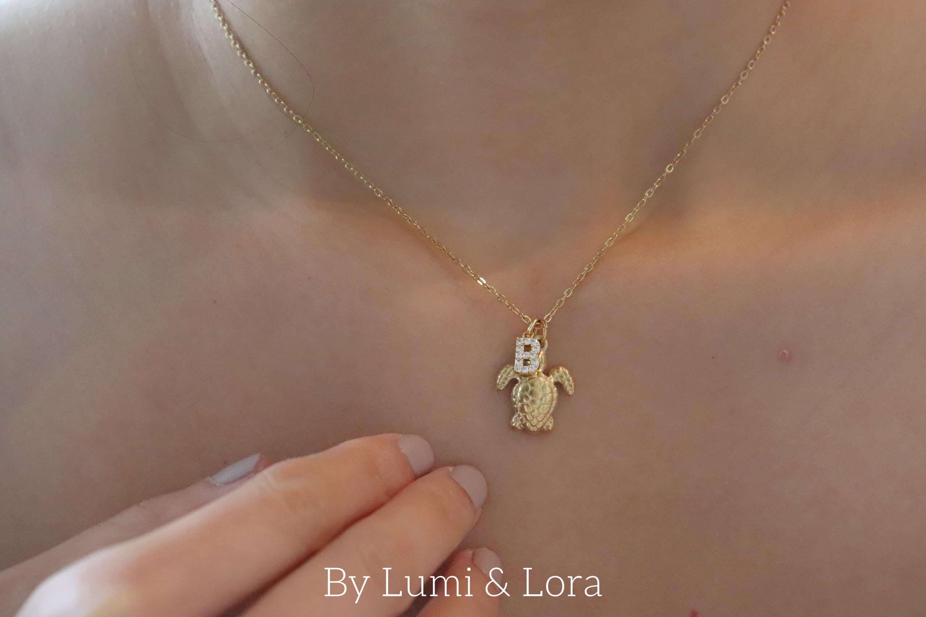 thumbnail interactive-video image 1 of 12-Pack White Faux Yak Bone Sea Turtle Pendant Necklaces - Adjustable Choker Style, Unbranded 1 of 2