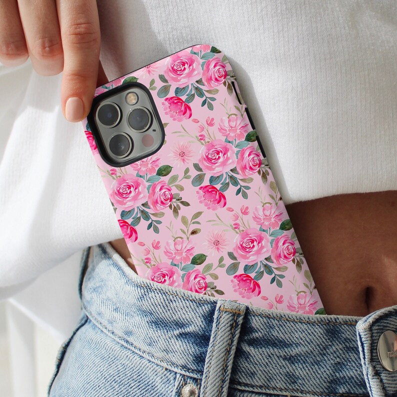 My pink Coquette Floral Phone Case features a soft pink background and a collage of pink bouquets of flowers and greenery. It has a sweet, preppy aesthetic and is perfect for garden girls and spring or summer. Available for iPhone, Samsung & Pixel