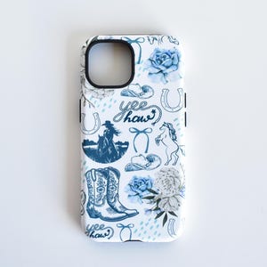 Coastal Coquette Cowgirl Phone Case. Featuring a collage of western inspired elements in shades of white and blue, mixed with some coquette style bows and flowers. The background is white and the colour palette is coastal and calm. For iPhone, Samsung & Pixel