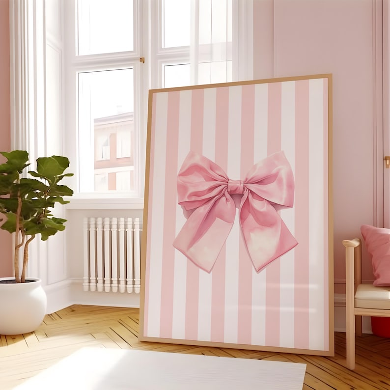 My cute coquette pink bow print. The bow has a watercolour look to it. This print has white and pink stripes in the background with a large pink bow in front. Perfect for a nursery, bedroom, dorm room, apartment or a gift for a bff, daughter, sister.
