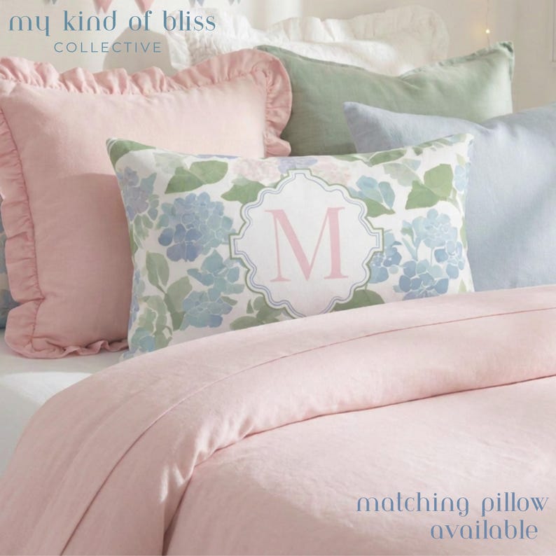 Matching hydrangea monogram dorm pillow available with personalized initials, coordinating preppy dorm room decor set