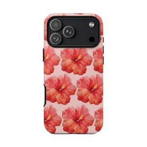 This phone case features a tropical collage pattern of red watercolour hibiscus flowers on a soft pink background. Perfect for coconut girls and beach lovers. Available for iPhone, Samsung and Pixel Phones. Summer Phone Case. iPhone 17 Pro Max Protective Case