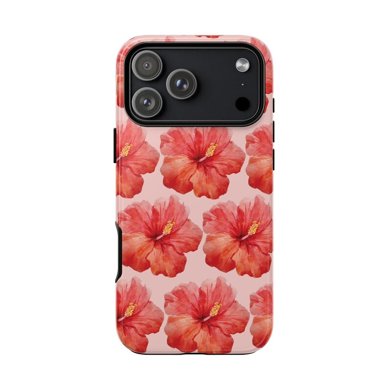 This phone case features a tropical collage pattern of red watercolour hibiscus flowers on a soft pink background. Perfect for coconut girls and beach lovers. Available for iPhone, Samsung and Pixel Phones. Summer Phone Case. iPhone 17 Pro Max Protective Case