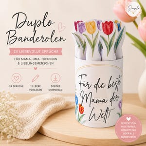 May include: A white cylindrical container with colorful tulip-shaped cards. The container has text in German, including "Für die beste Mama der Welt!" and "Duplo Banderolen." The container is on a wooden surface, with a bouquet of pink tulips in the background.
