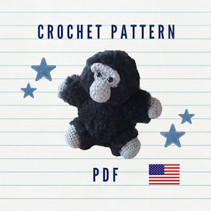 May include: A crochet pattern for a plush gorilla toy. The gorilla is black with gray accents on the face, hands, and feet. The text "CROCHET PATTERN" and "PDF" are displayed. Denim star accents and the American flag are also shown.
