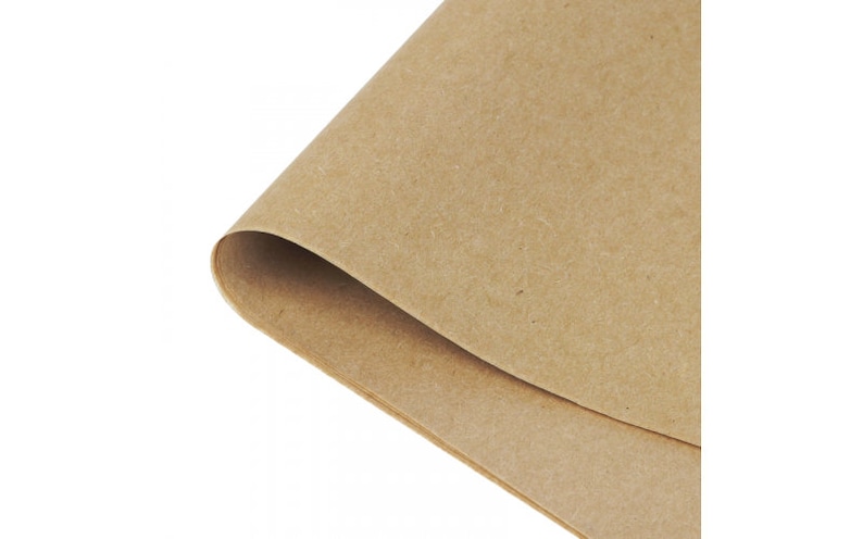 May include: A sheet of brown craft paper, folded in half, with a textured surface.