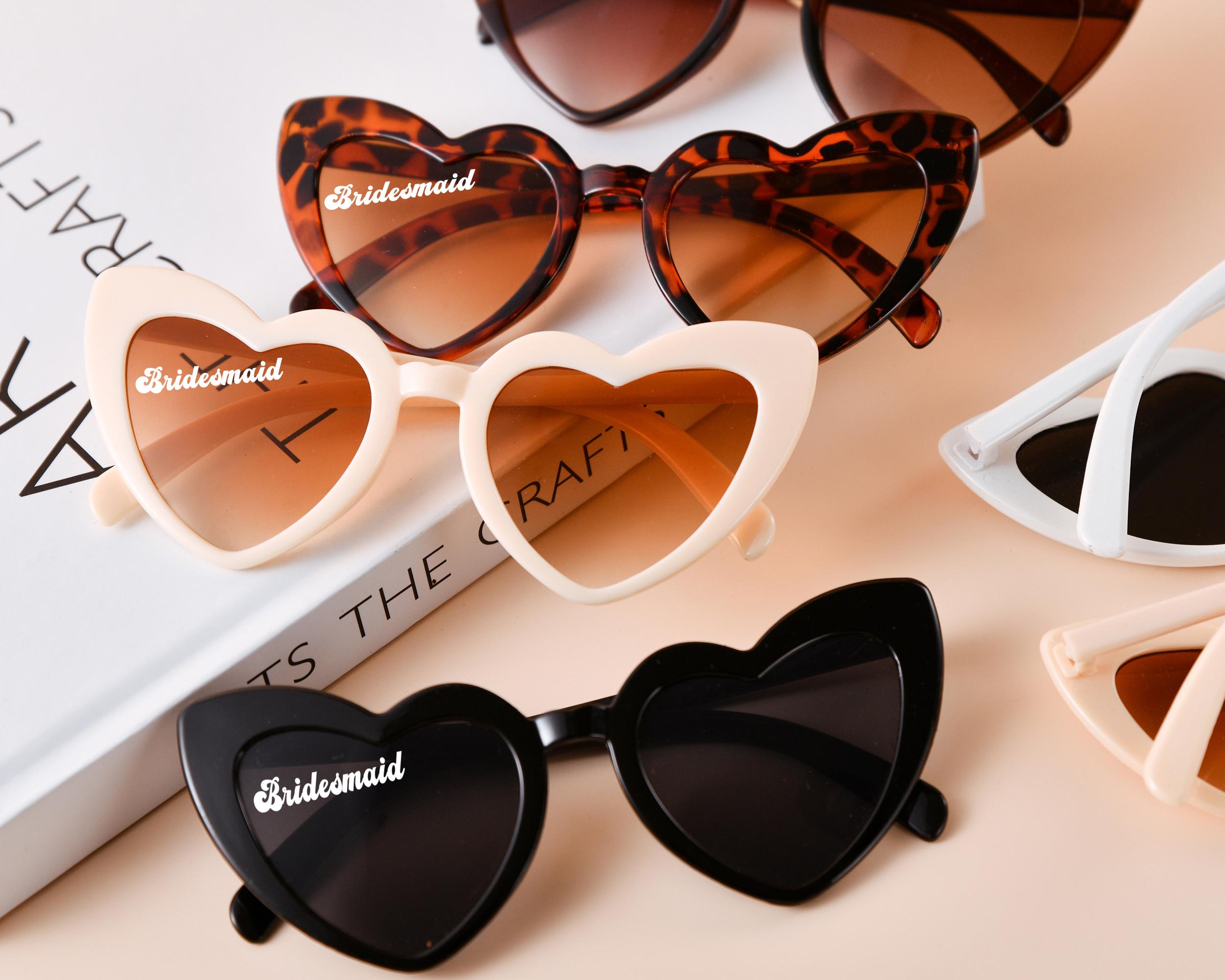 Gold rimmed heart shaped sunglasses hotsell