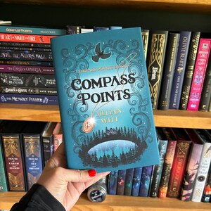 Podpisana twarda oprawa Compass Points autorstwa Jillian Witt