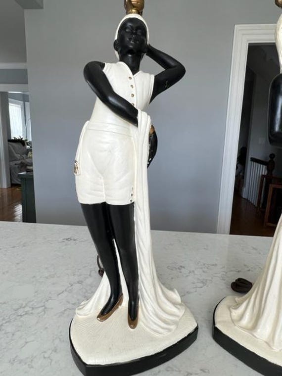 Pair of Vintage MCM Blackamoor Style Nubian Woman and Man