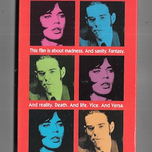 May include: A VHS tape cover for the film "Performance" starring James Fox and Mick Jagger. The cover features four images of the actors in different colors. The text on the cover reads "This film is about madness. And sanity. Fantasy. And reality. Death. And life. Vice. And Versa."