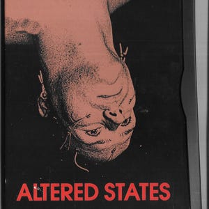 May include: DVD cover for the movie Altered States. The cover features a black and white image of a person upside down with their head in the center of the image. The person's face is visible and they have wires attached to their head. The text "ALTERED STATES" is in red letters at the bottom of the cover.