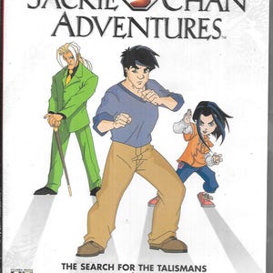 May include: DVD case for "Jackie Chan Adventures." The cover features cartoon illustrations of three characters in action poses. Text includes the show title, episode titles, and a rating.