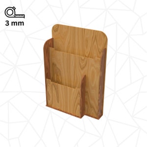 Peut inclure: Porte-revues en bois avec trois compartiments. Le porte-revues est en bois brun clair avec une garniture en bois brun fonc&eacute;.