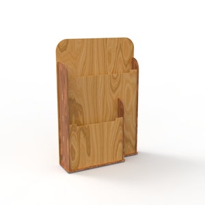 Peut inclure: Un porte-revues en bois avec deux compartiments. Le porte-revues est en bois brun clair avec un grain de bois naturel.