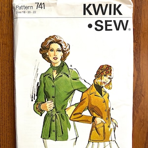 May include: A vintage sewing pattern for a jacket, featuring two women wearing different styles of jackets. The pattern is labeled "Kwik Sew" and "Pattern 741, Sizes 18-20-22".