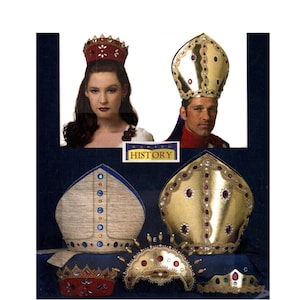 May include: Image of historical headwear, including crowns and miters. The image features a woman wearing a red crown and a man wearing a gold miter. Other items include a gold crown and two additional miters. The text "MAKING HISTORY" is also visible.