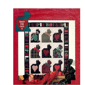 May include: A quilt pattern titled Crazy for Cats II featuring a grid of nine cat silhouettes. Each cat is crafted from various dark fabrics with contrasting heart or bow accents. The border is a dark patterned fabric on a light background.