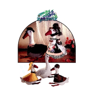 May include: A collection of five plush goose figures. Two large geese are dressed in formal attire, one in a black suit and hat, the other in a floral dress and bonnet. Three smaller geese wear a yellow raincoat, a brown patterned vest, or no clothing.