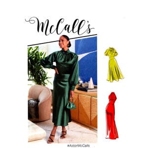 May include: A woman in a dark green satin dress with long sleeves and a high neckline, holding a small green purse. The image includes the text "McCall's" in cursive and two dress illustrations in yellow and red.
