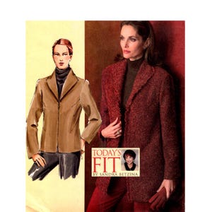 May include: A sewing pattern envelope featuring a tan jacket illustration and a photograph of a textured dark red jacket. The text reads TODAY'S FIT BY SANDRA BETZINA. The design includes a collared jacket, a dark turtleneck, and matching pants.