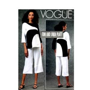 May include: A black and white top with a geometric design and white cropped pants. The image is from a Vogue pattern book by Tom and Linda Platt.
