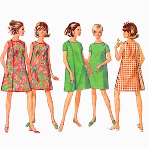 May include: A collection of five sleeveless and short-sleeved shift dresses in various patterns and colors, including floral prints in pink and green, solid green designs, and an orange and white checkered pattern, all featuring a knee-length hemline.