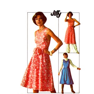 May include: A Jiffy sewing pattern envelope featuring a sleeveless pink dress with a white floral print and a waist tie. The image also displays a pink floral dress worn over white pants and a blue sleeveless dress worn over a white turtleneck.