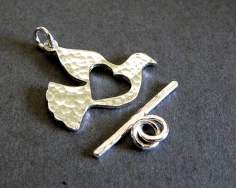 Dove bird with heart toggle clasp set handmade in sterling silver or 14k gold filled. Necklace or bracelet closure. AGB jewelry findings.