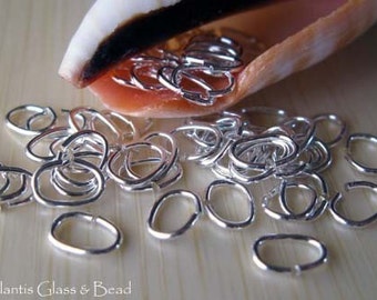 Oval jump rings 22 gauge 5mm 50 pieces. AGB handmade artisan sterling silver or 14k gold filled jewelry findings.
