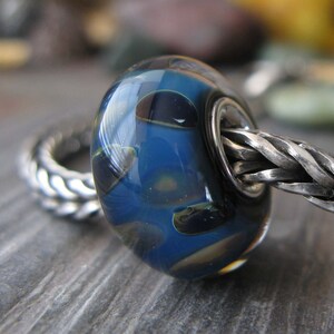 AGB sterling silver core boro glass lampwork bead, Look Back... image 1