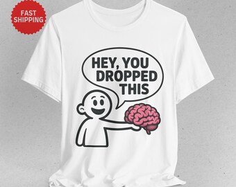 Camiseta "Oye, se te cayó este cerebro", divertida camiseta gráfica con frases sobre pensar demasiado