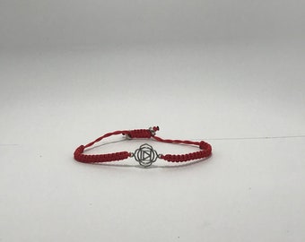 handgemaakte armband met chakra bedel, eerste chakra de basischakra