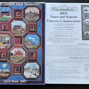 May include: A 2003 Piecemakers Times and Seasons quilt pattern book and calendar. The cover features a multi-colored quilt with twelve hexagonal scenes of rural life. The adjacent page provides detailed instructions, fabric requirements, and a finished size of 80 inches by 80 inches for the quilt project.