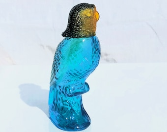 AVON - flacon - perruche - verre BLEU translucide - tête en bakélite AMBRE