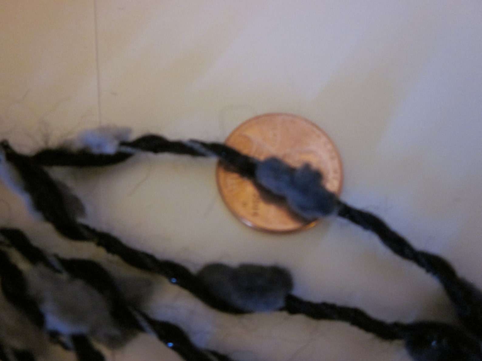 Threads Things That Go Puff In The Dark Handspun Suri Alpaca Polly Puffs Metallic Thread ART Yarn bumps in the