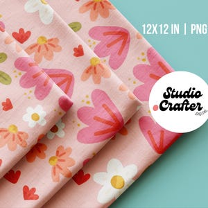 Puede incluir: Un archivo de patrón digital con un diseño floral repetitivo sobre un fondo rosa claro. El estampado incluye flores rosas, naranjas, blancas y verdes con pequeños puntos amarillos. El texto 12X12 IN | PNG y el logo Studio Crafter DIGITAL son visibles.