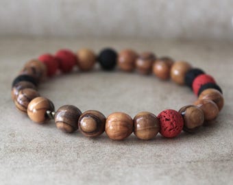 Handcrafted Hebrew Jewelry from Israel, Volcanic Lava Bracelet, Unisex Bracelet With Olive Wood Beads