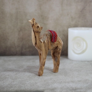 5.5&quot; Olive Wood Camel Statue Hand Carved in the Holy Land Figurine Red Saddle. Handmade in the Holy Land, Jerusalem