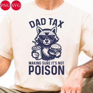 May include: Cream-colored t-shirt featuring a raccoon wearing sunglasses, holding a drink and a burger. The text "DAD TAX" is above the raccoon, and "MAKING SURE IT'S NOT POISON" is below. The design is in navy blue.