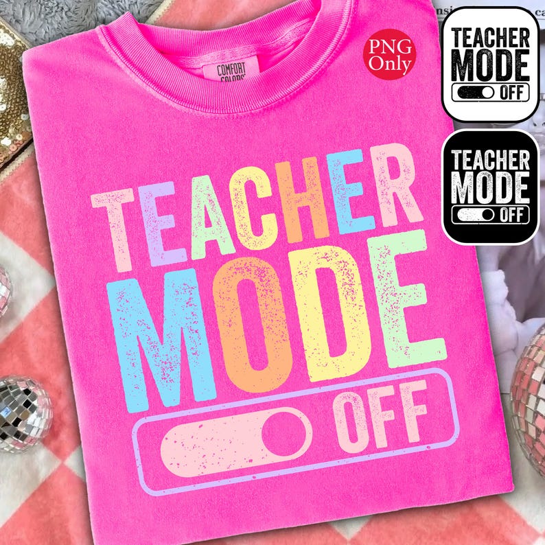May include: A bright pink t-shirt with the words "TEACHER MODE OFF" in a colorful, distressed font. The design includes a toggle switch graphic. Additional small graphics with the same text are in the upper right corner. The shirt is made of a soft material.