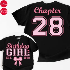 May include: Black t-shirts with pink text and graphics. One shirt says "Birthday GIRL" with a bow and "EST. 1998". The other shirt says "Chapter 28". Both shirts are likely for a birthday celebration.