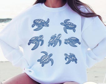 Sudadera de cuello redondo con diseño de tortuga marina: Regalo ideal para amantes del océano y la costa.