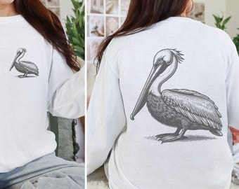 Camiseta de manga larga con estampado de pelícano dibujado a mano, estampado grande en la espalda y en el bolsillo.