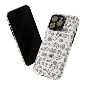 a phone case with a pattern of video game controllers on it