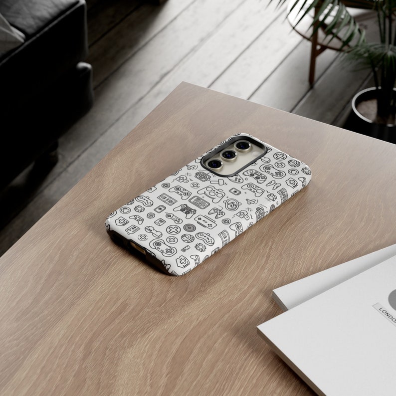 a cell phone sitting on top of a wooden table