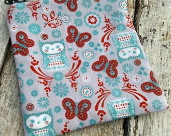 Aqua owls and red butterflies square zipper pouch