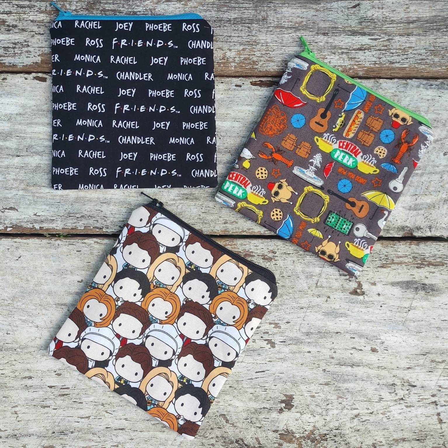 Friends themed square zipper pouches. The one with the names. Etsy
