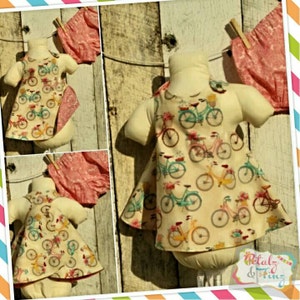 Reversible dress and bloomers set. Flower delivery bicycles reverses to pick and cream floral.