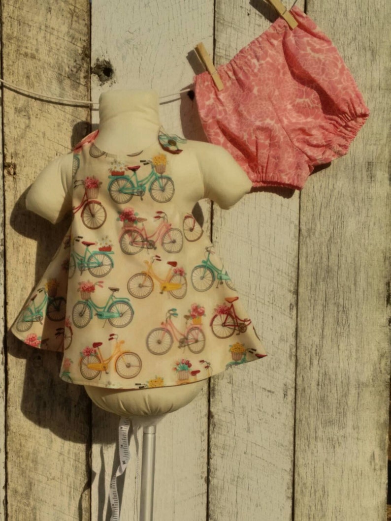 Reversible dress and bloomers set. Flower delivery bicycles reverses to pick and cream floral. image 2